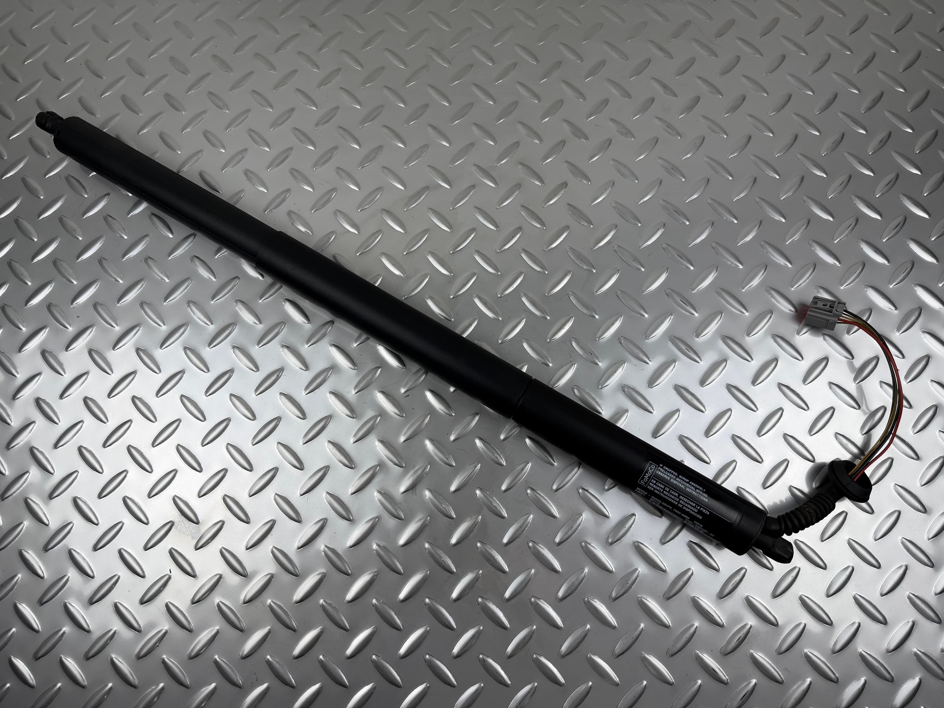 Амортизатор двері багажника лівий Ford Escape MK3 13-19 електро